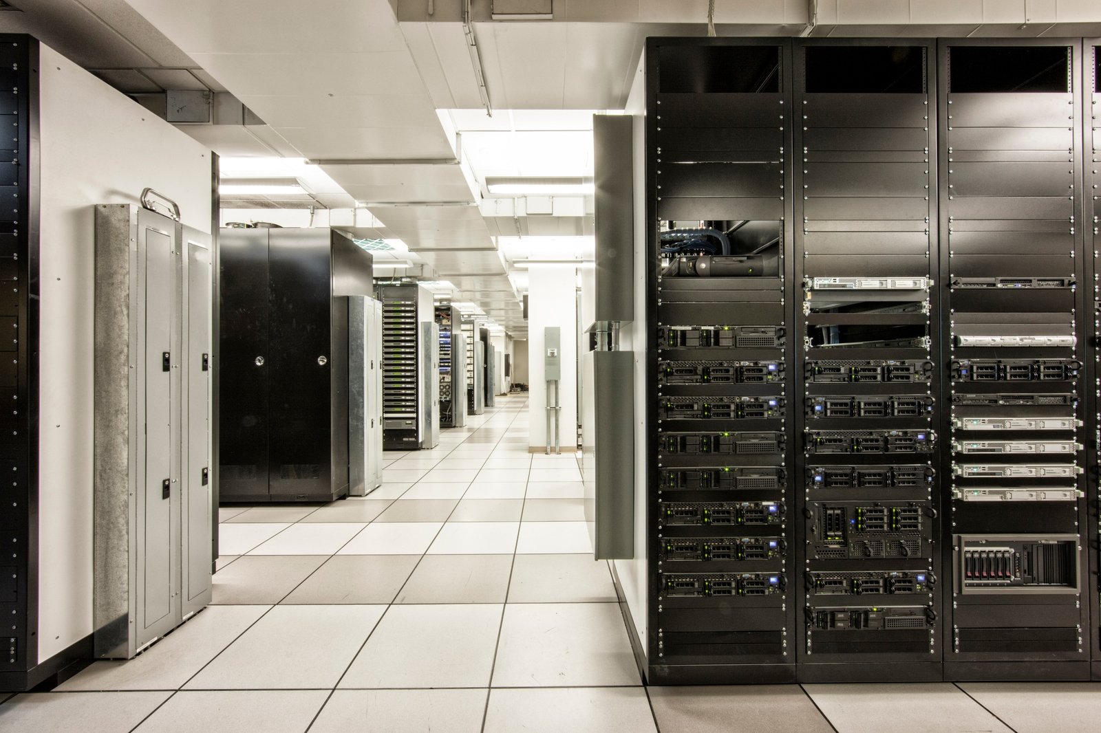 Storage racks aligned in a computer server room.